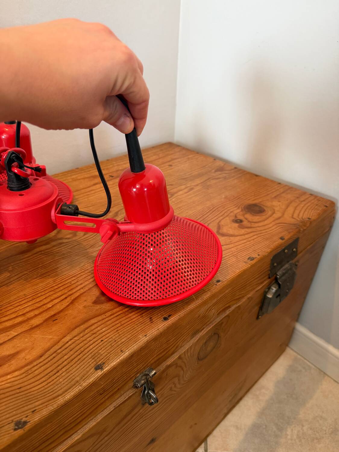 Three-lamp suspension in Memphis design style in red metal.