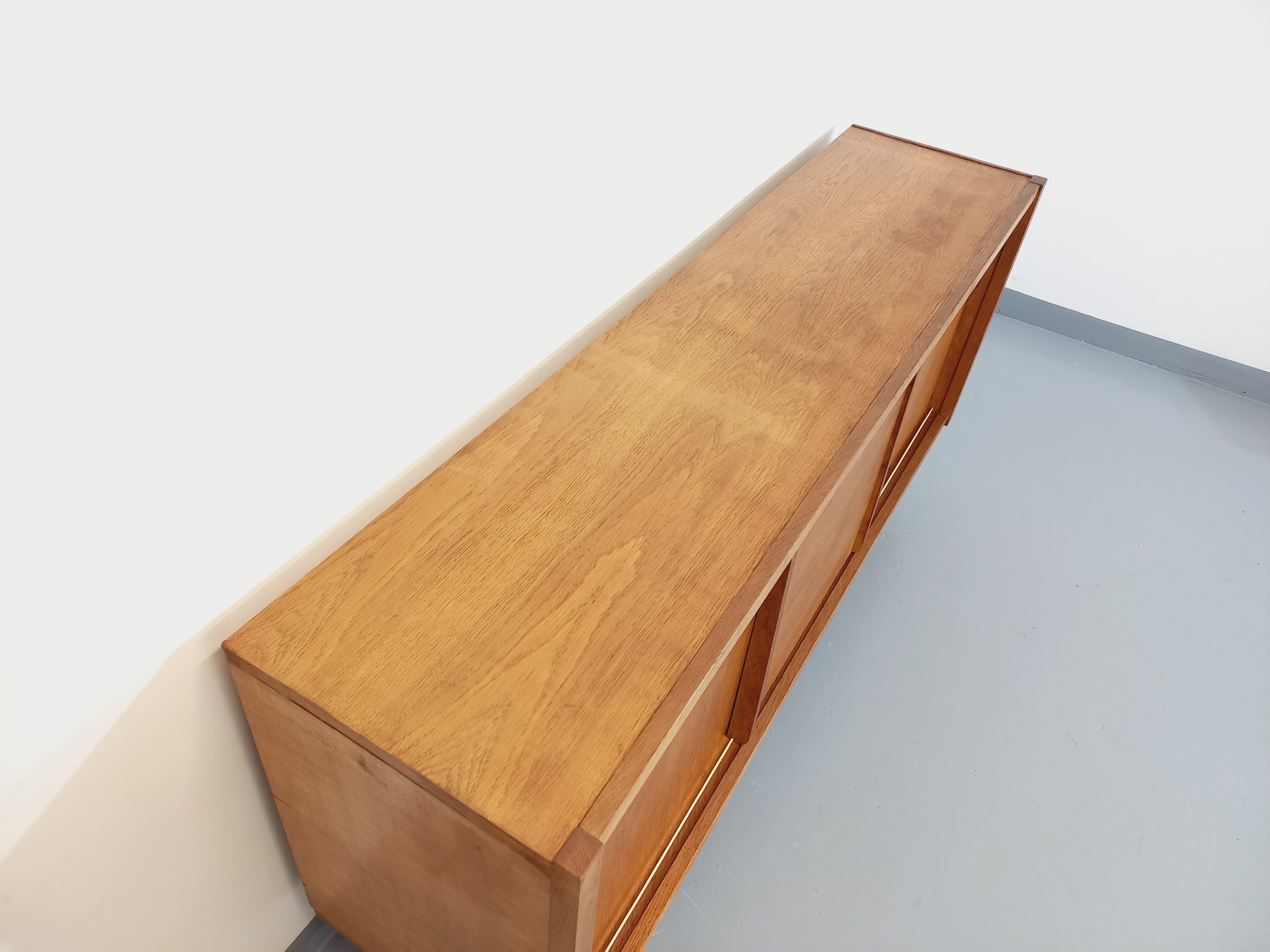 Vintage row in light oak wood from the 60s