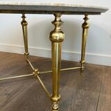 Brass coffee table with a white marble top.