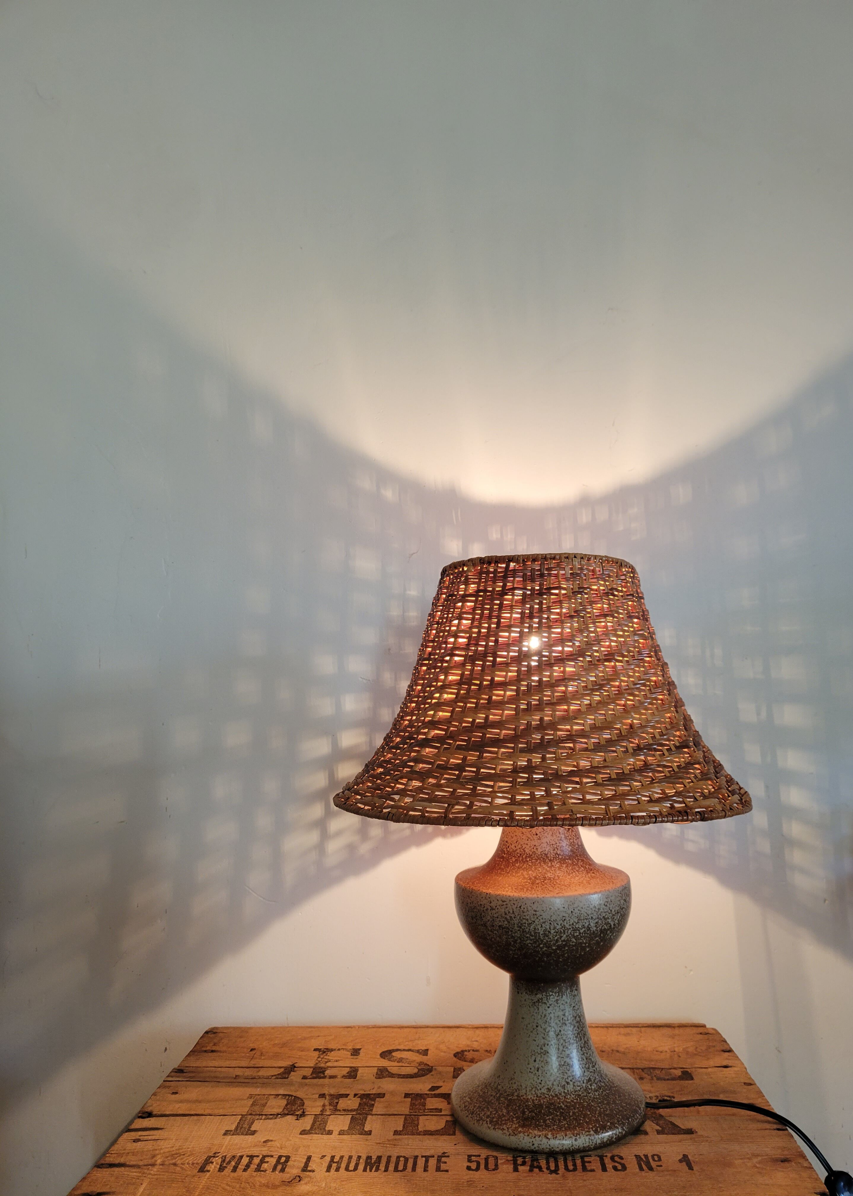Stoneware and rattan lamp