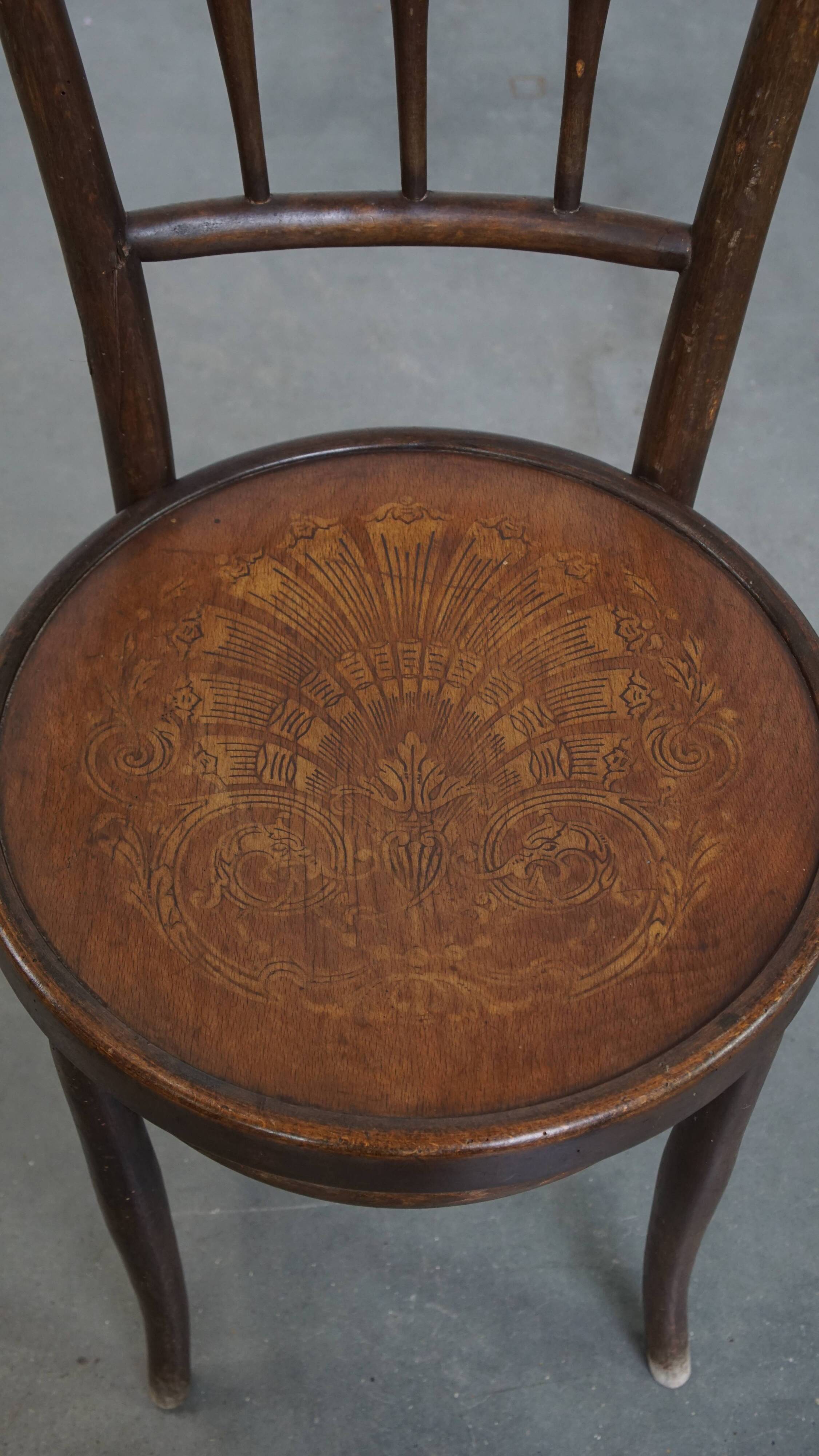 Bistro chair with carved seat