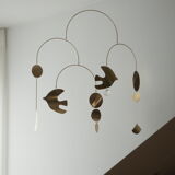 Mobile model Rana . Mobile in abstract brass.