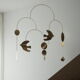 Mobile model Rana . Mobile in abstract brass.