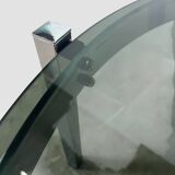 Vintage round coffee table with smoked glass and chrome.