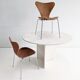 Round dining table in travertine from the 1980s.