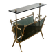 Brass magazine rack and blue-tinted glasses