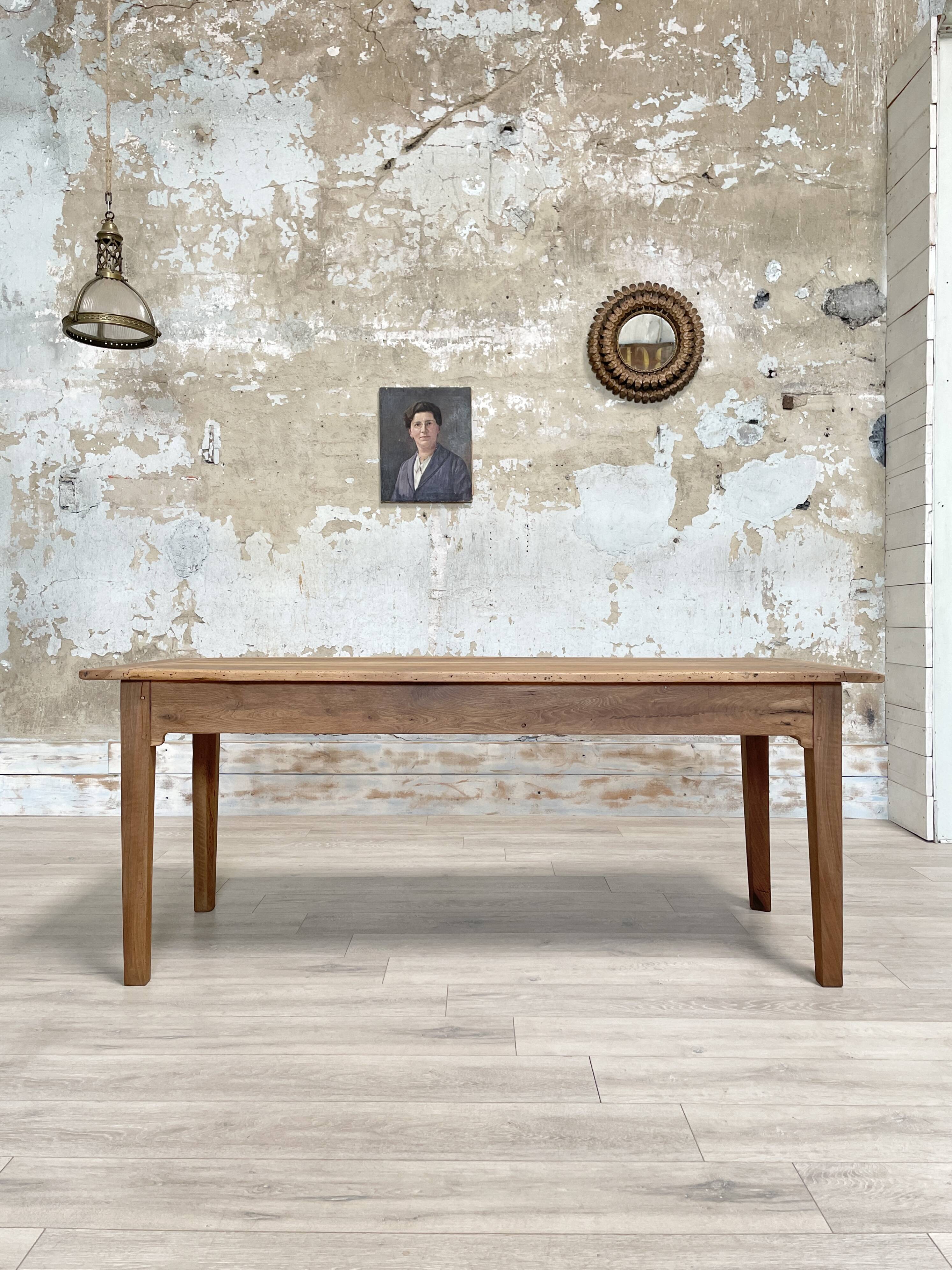 Vintage farmhouse table with spindle legs.