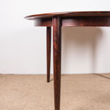 Danish extendable dining table in Rio Rosewood model 55 by Arne Vodder for Sibast 1958.
