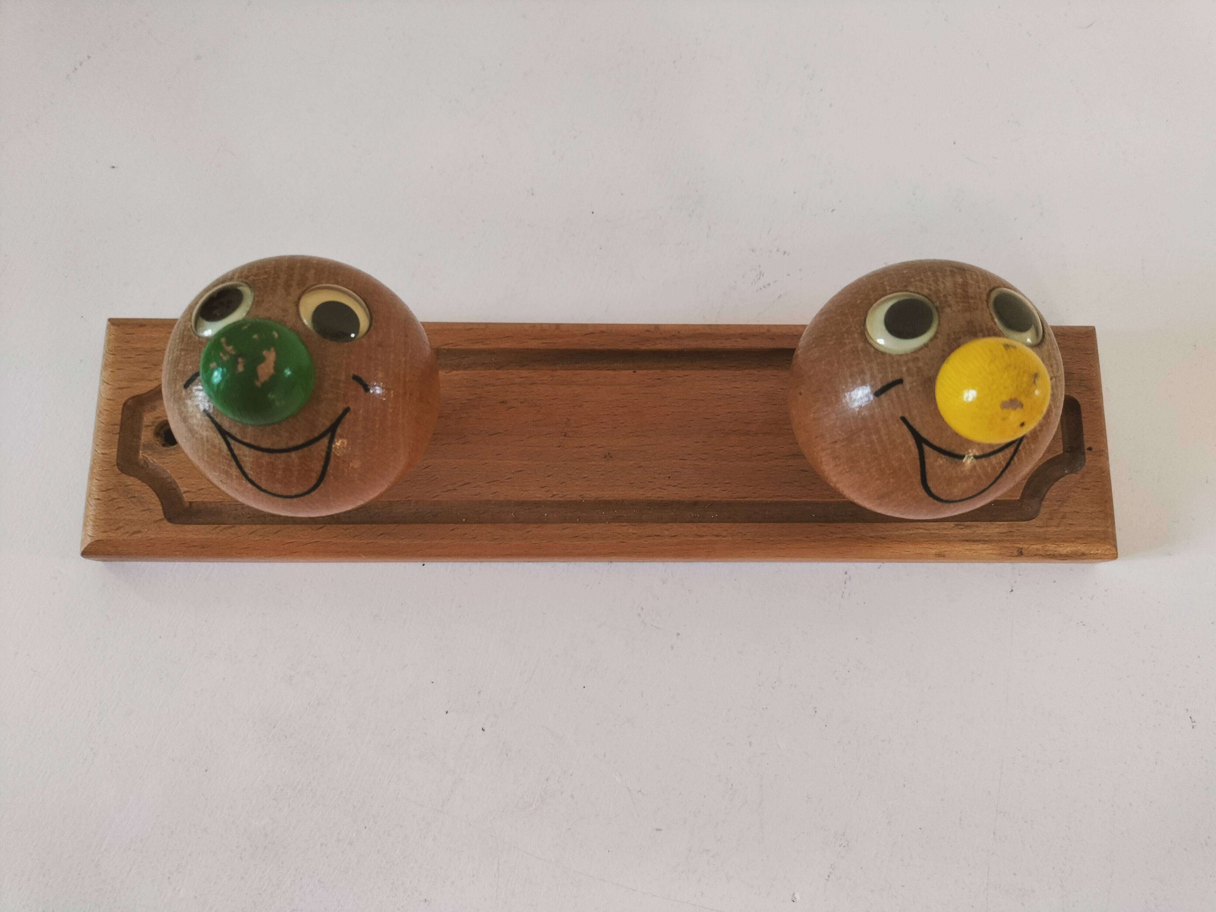 Vintage wooden children's coat rack - smiling heads hooks