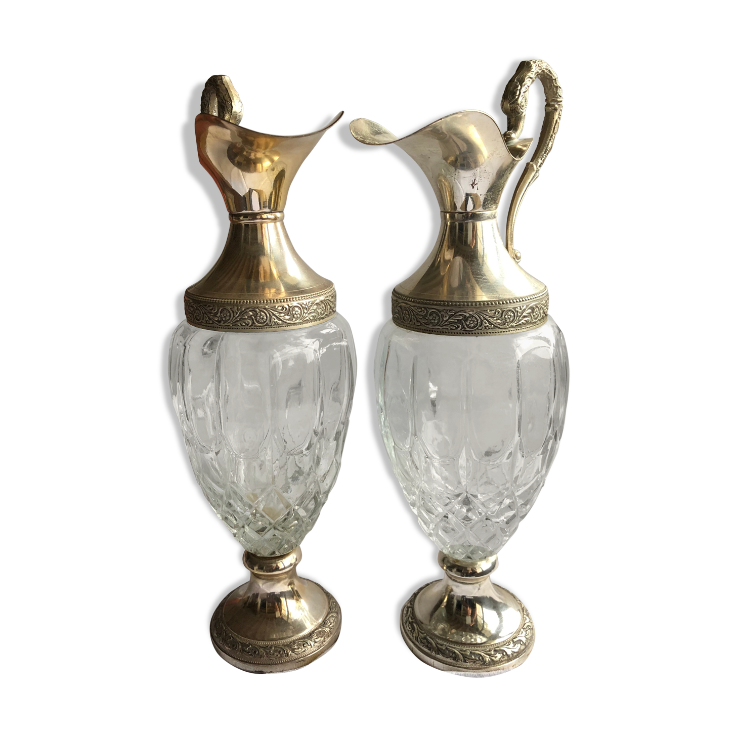 Pair of glass and silver metal ewers