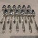 12 silver plated dessert spoons, Argental art deco goldsmith