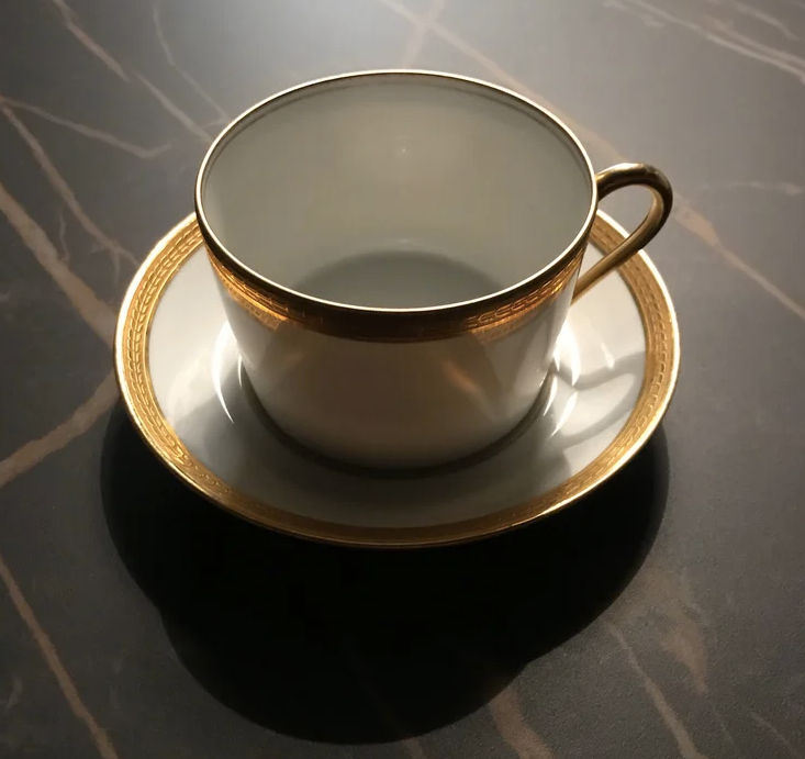 5 Haviland tea cups and sub-cups