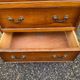 2 English wooden chests of drawers with 4 drawers
