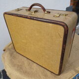 1930s Oshkosh suitcase with bakelite hangers