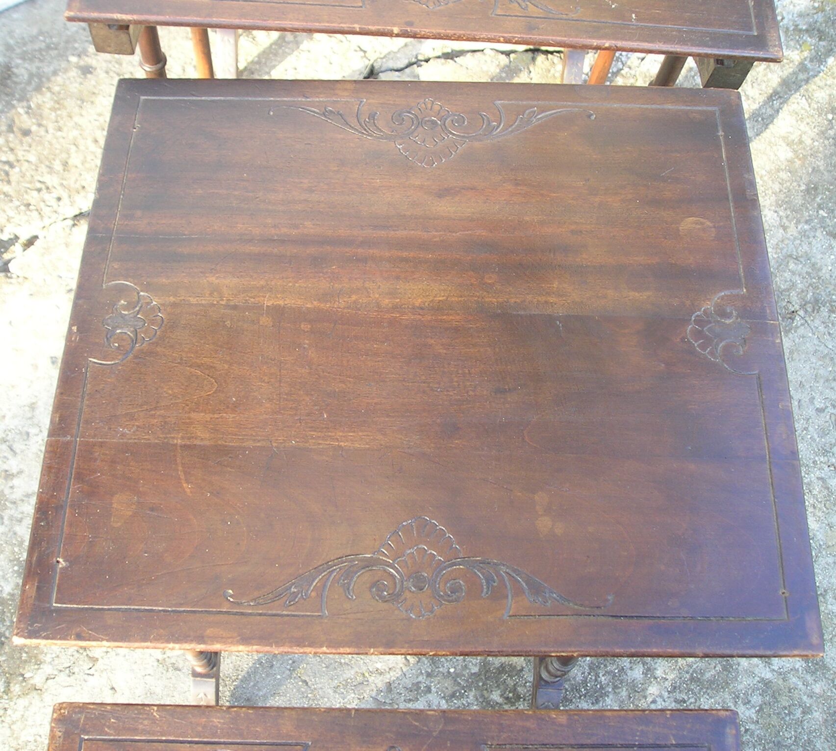 Set of 4 old tables with carved trays