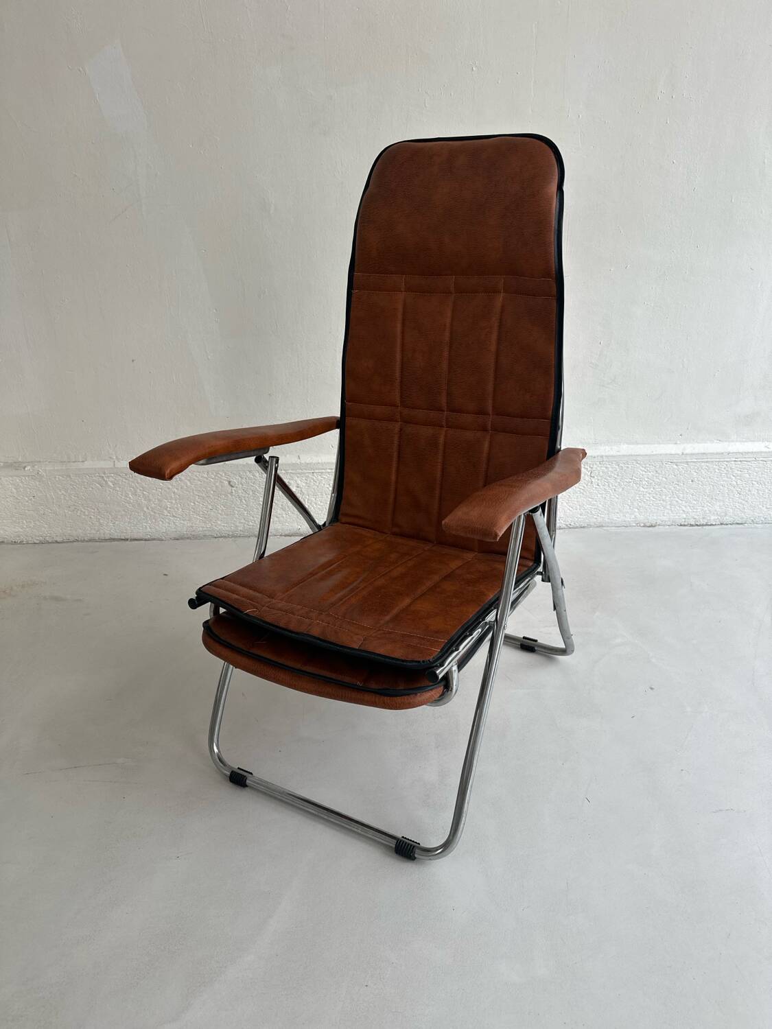 Authentic vintage reclining armchair