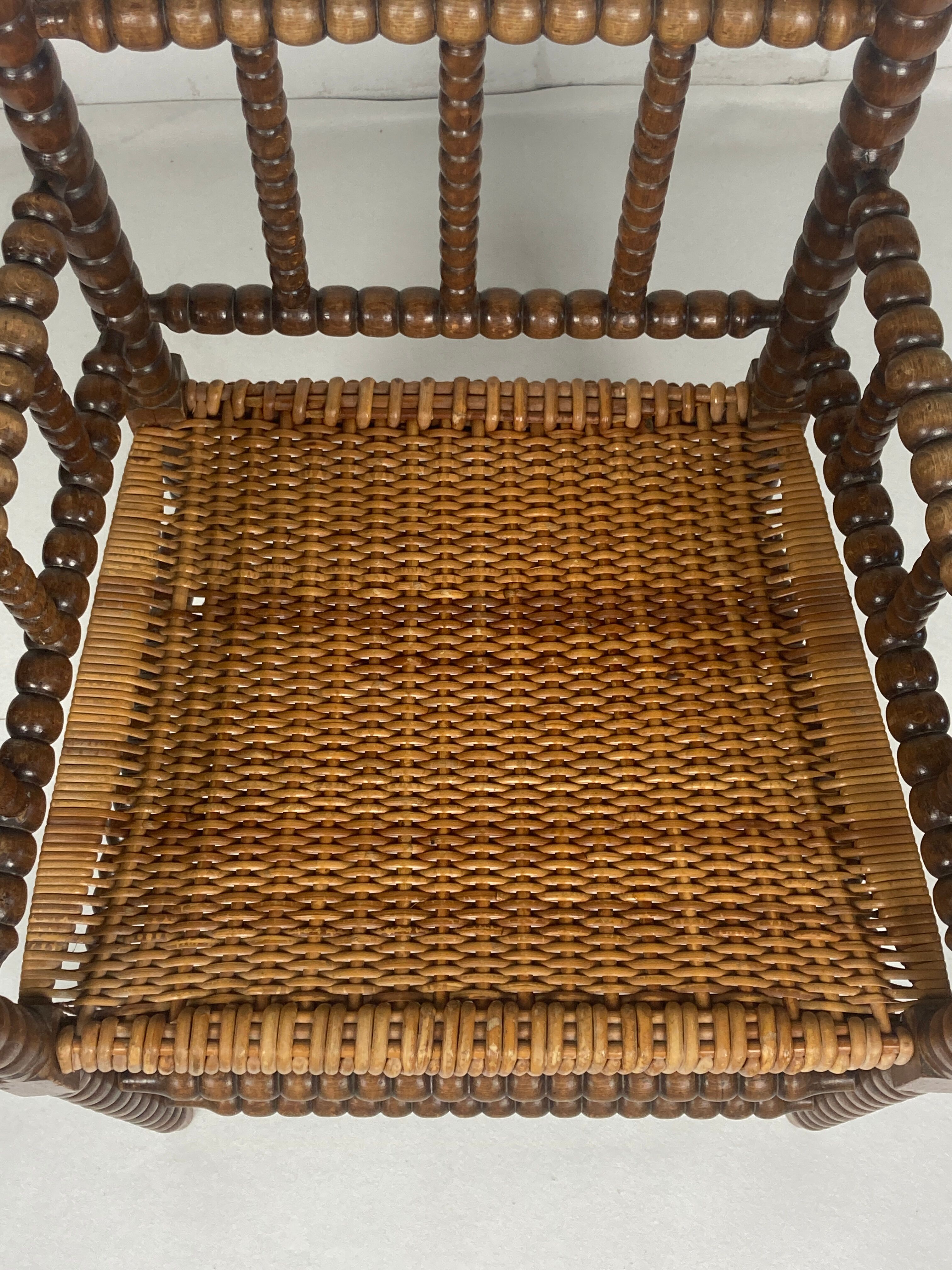 Fauteuil en osier et en bois tourné, années 1930 - 1950