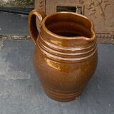 Pitcher old cider jug in glazed sandstone