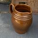 Pitcher old cider jug in glazed sandstone