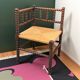 Chaise d’angle paillée bois tourné 1920