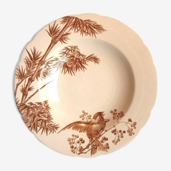 Assiette creuse art nouveau signée longwy,: palmier et oiseaux, fond rose