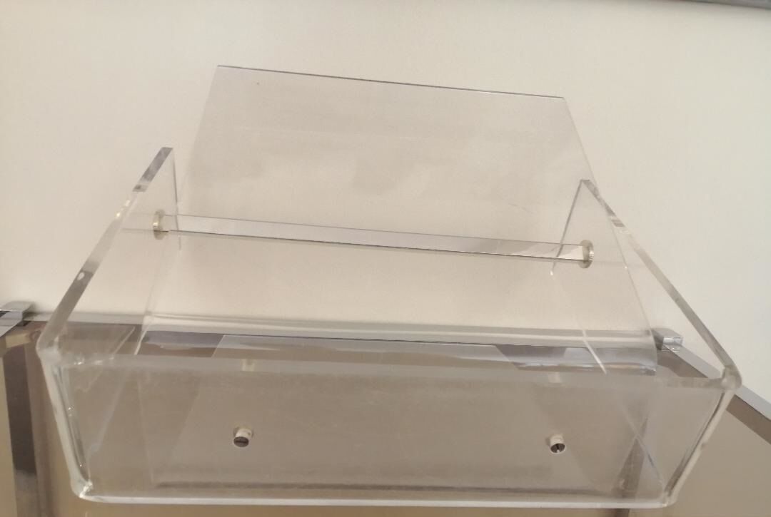 Magazine rack by David Lange for Roche Bobois