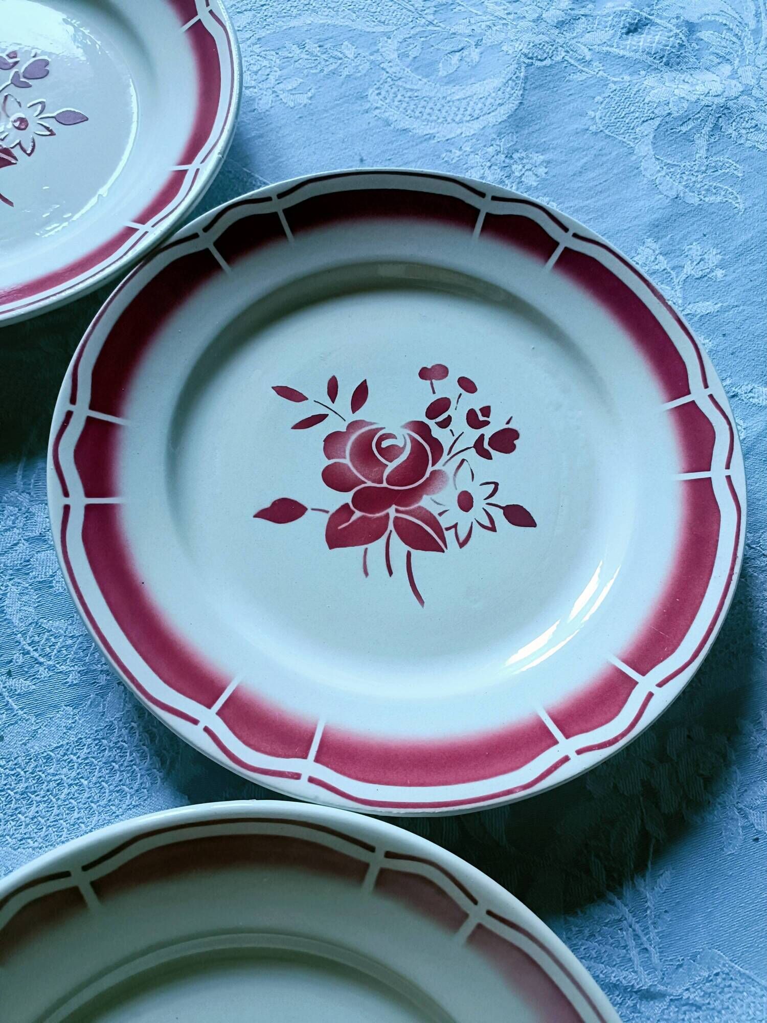 Five numbered opaque porcelain plates from Badonviller.