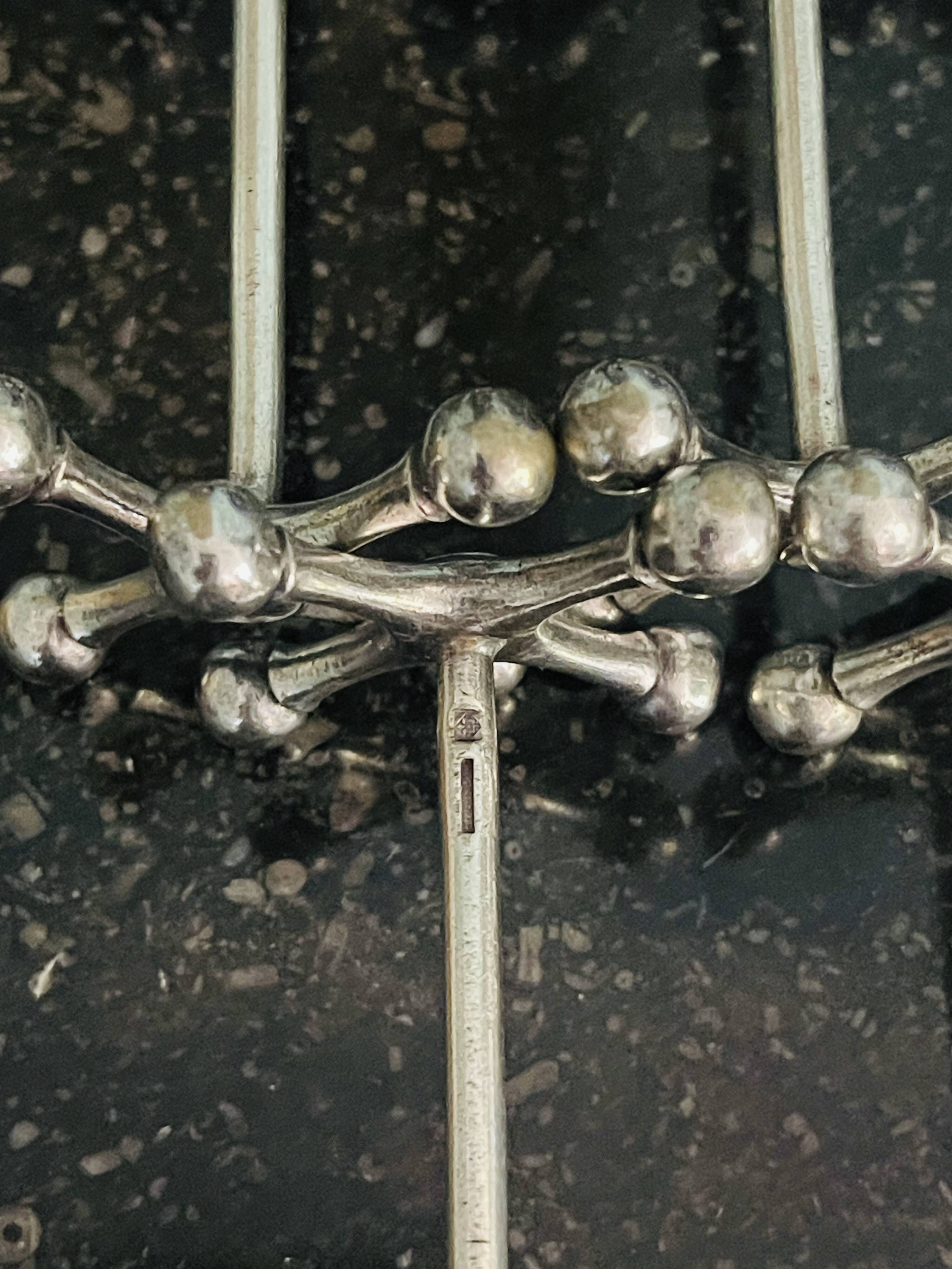 Christofle Atomium knife rest
