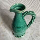 Small green ceramic pitcher