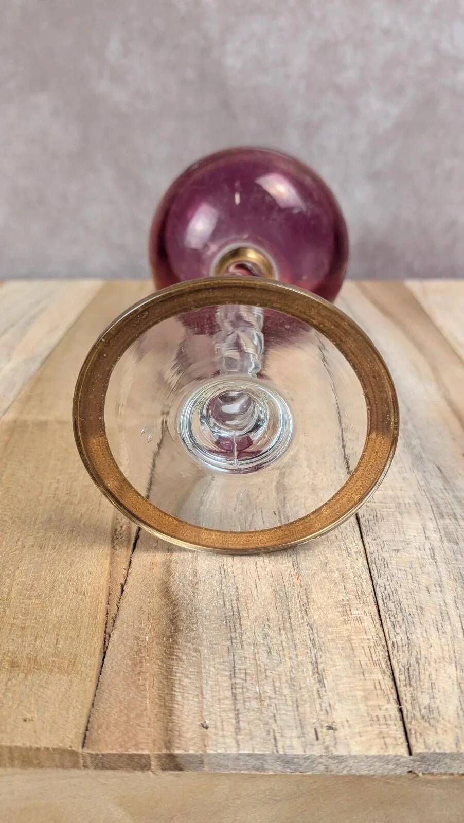 Antique fuchsia pink engraved glass – twisted stem