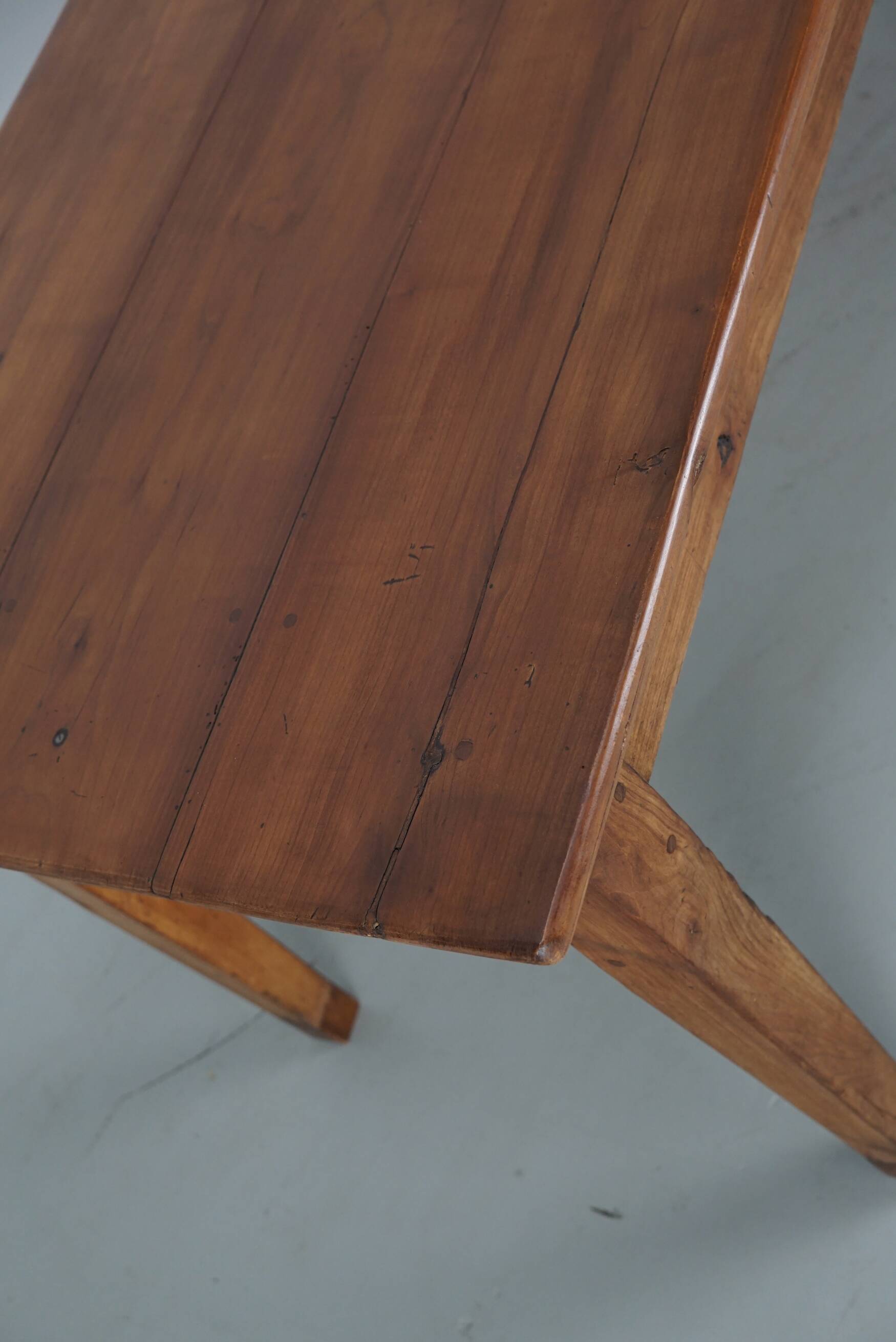 Rustic dining table in fruitwood from the early 20th century