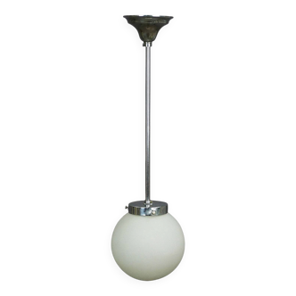 Functionalist suspension in Bauhaus style with opaline glass shade.