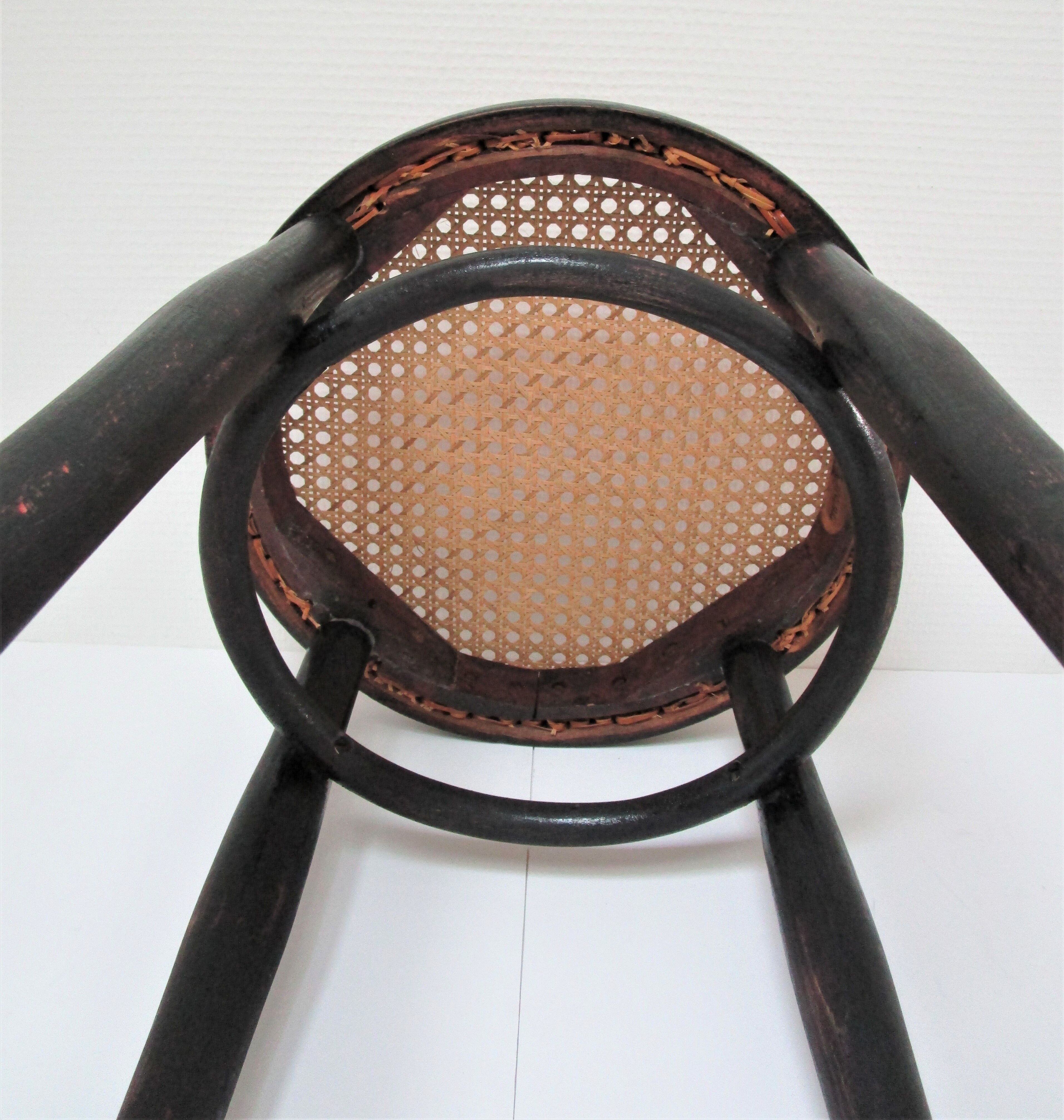 Black skated Thonet stool stamped