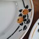 Service of 7 plates in earthenware