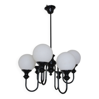 Metal chandelier and glass globes