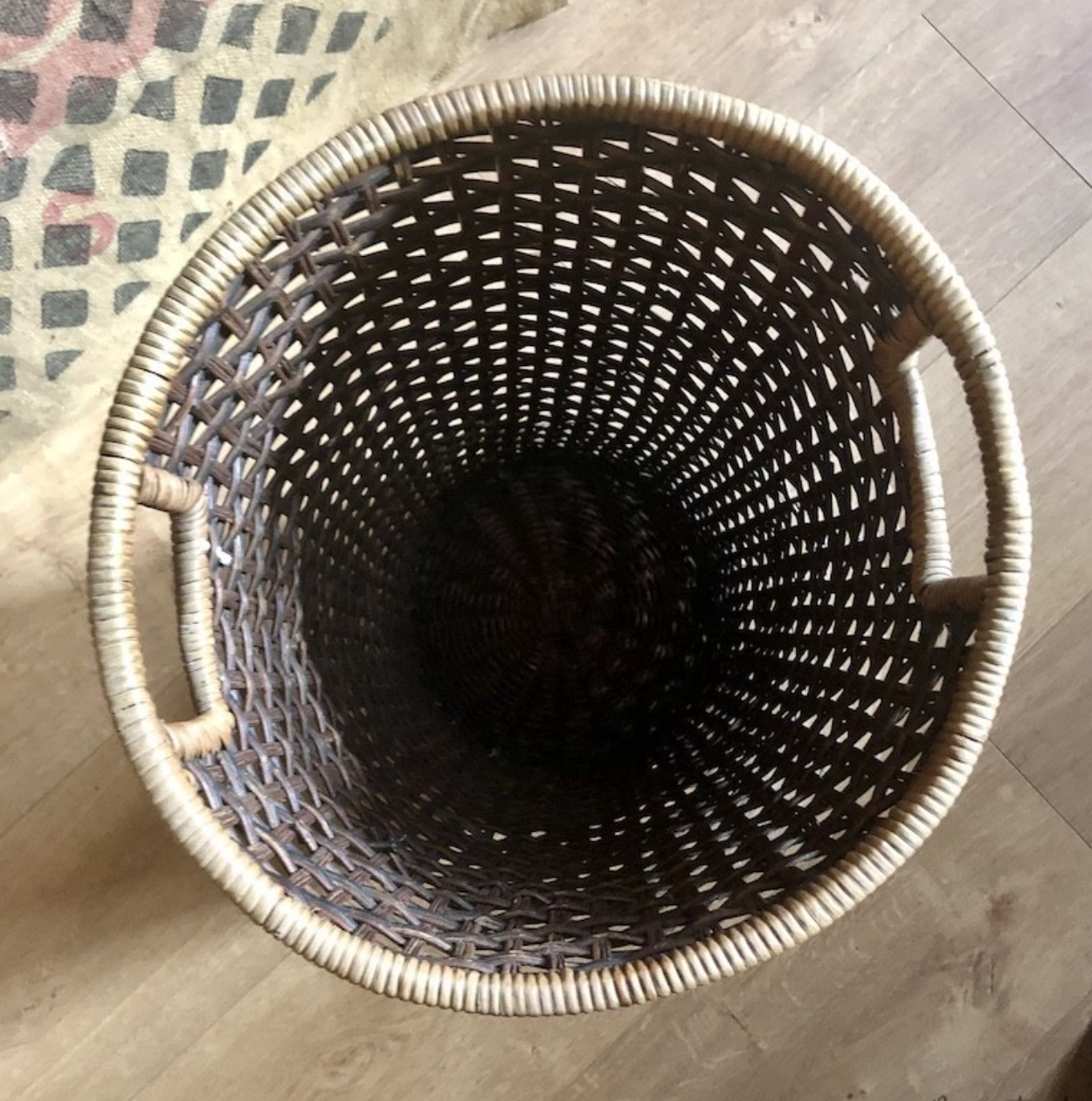 High basket in braided wicker