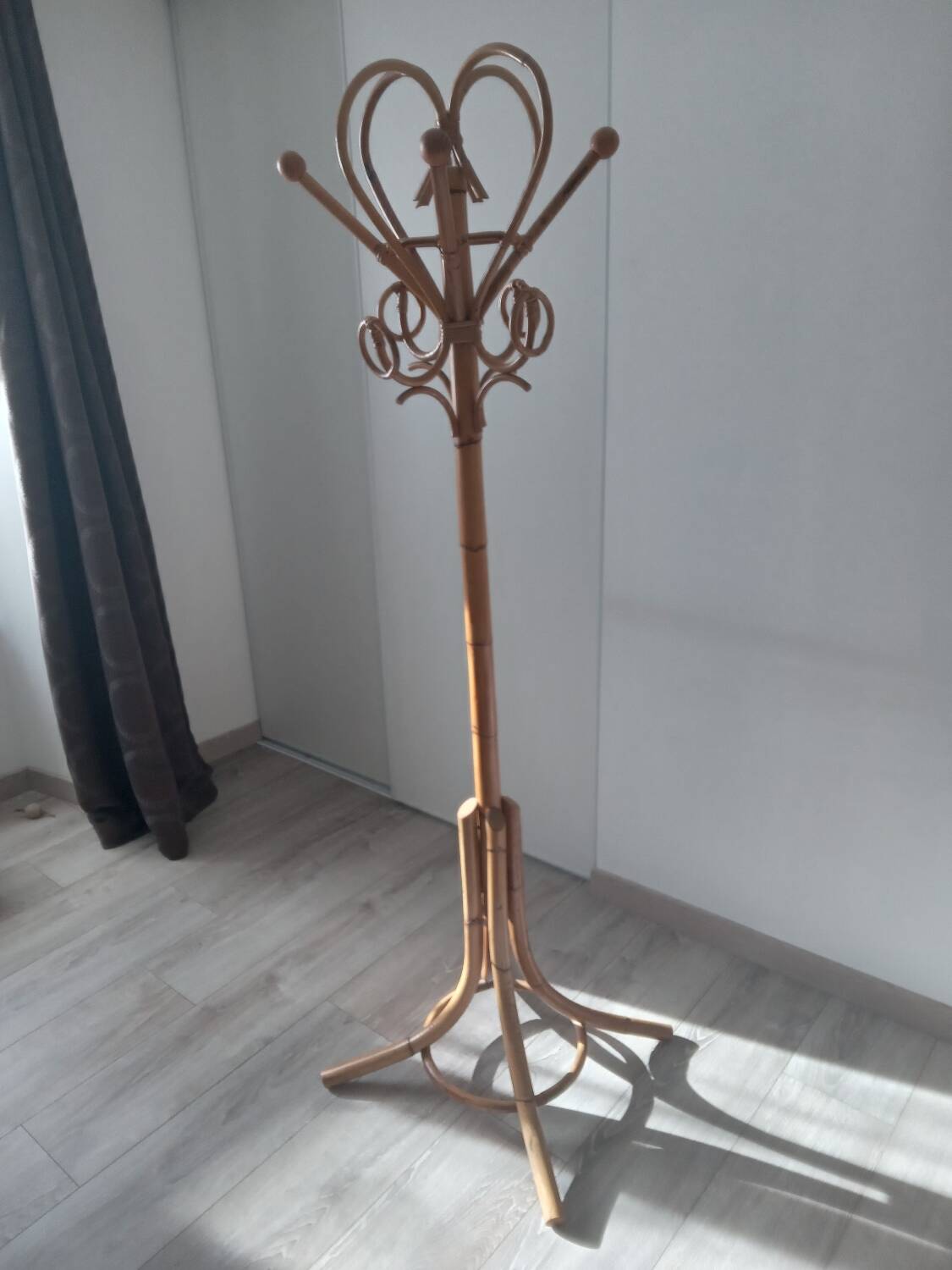 Beautiful rattan coat rack from the 1960s.