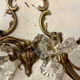 Louis XV style two-light bronze wall light with antique tassels