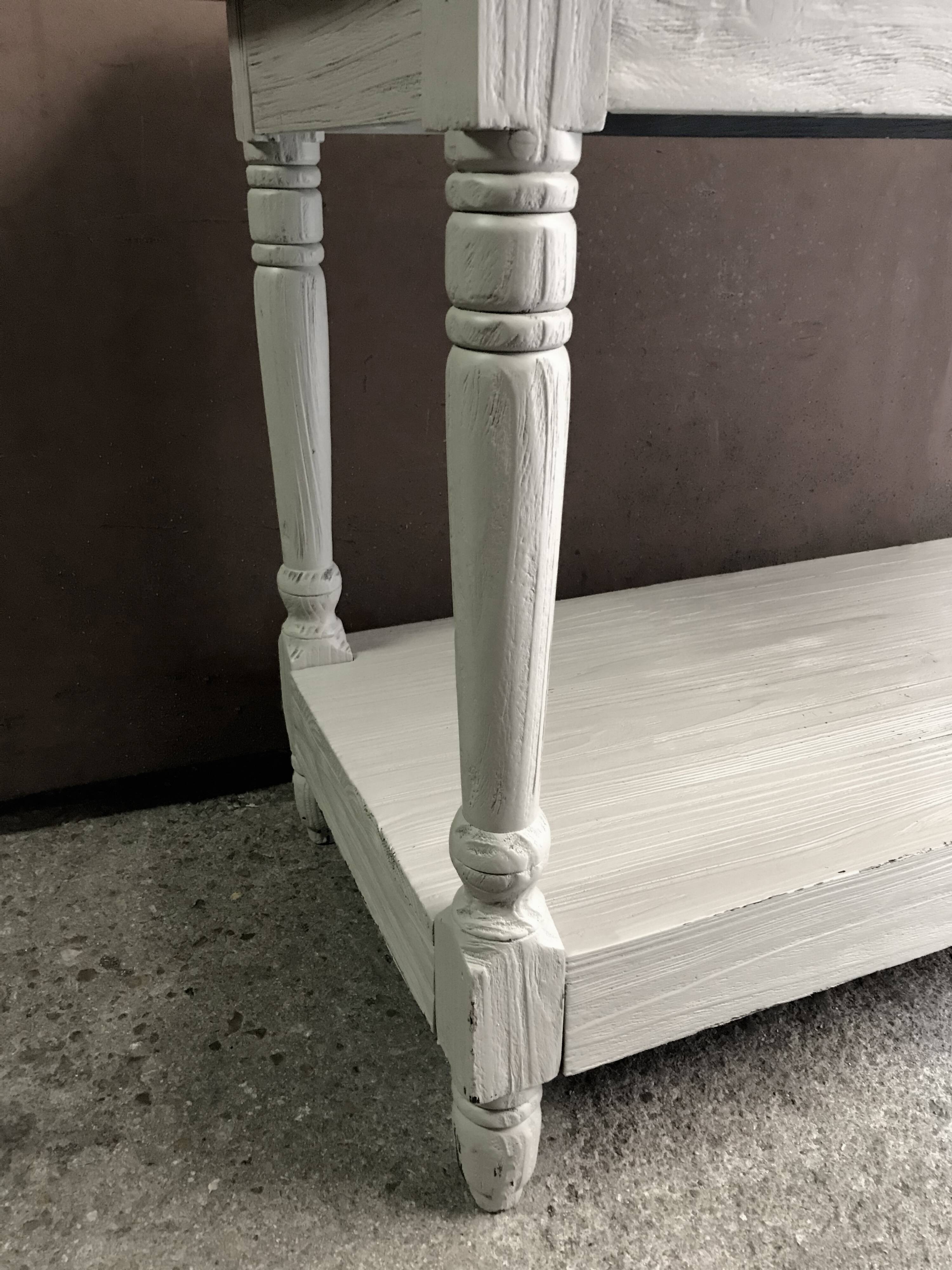 Table of drapier of light grey white color of 1.72 meters