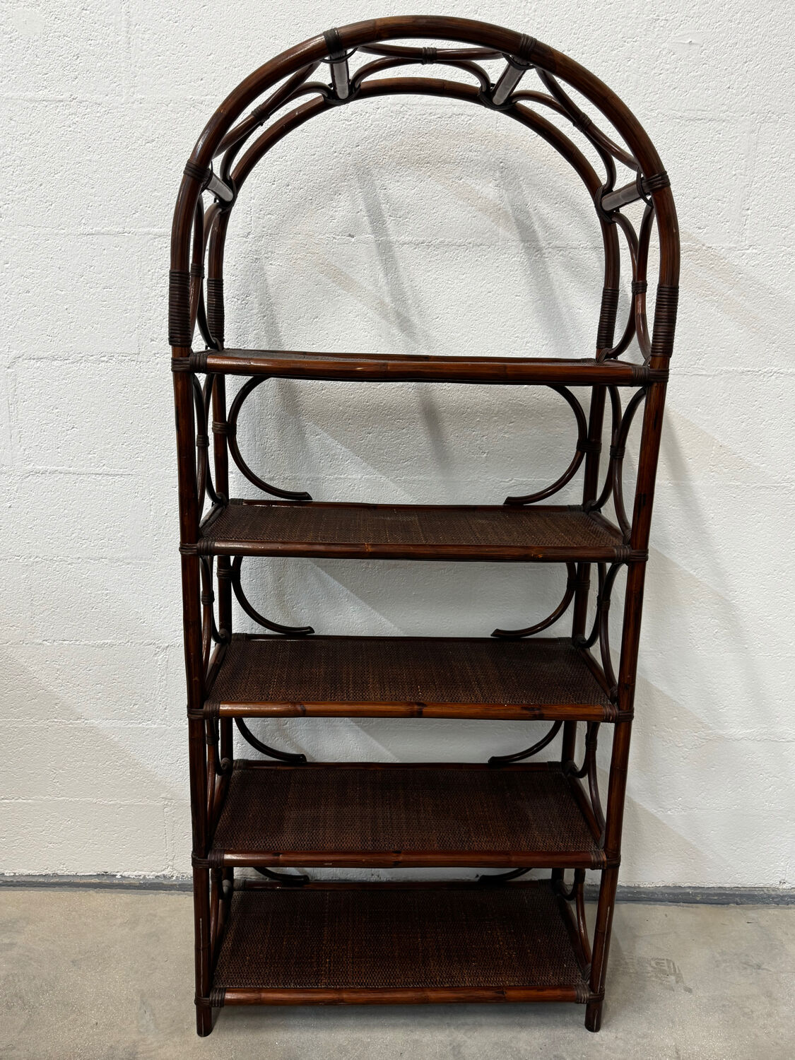 Dark rattan and bamboo bookshelf shelf