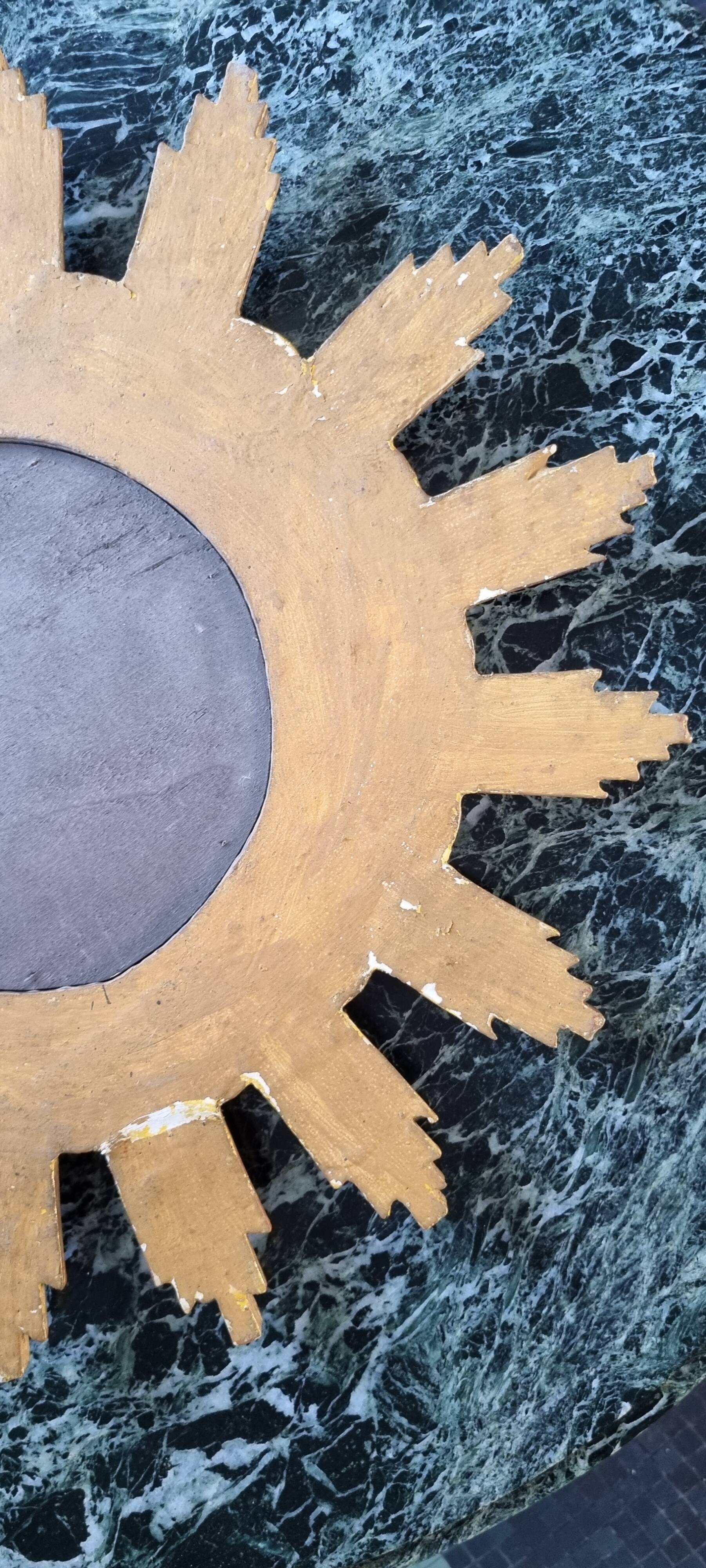 Vintage wooden and gold sun mirror