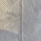 White woven cotton bedspread with fringes