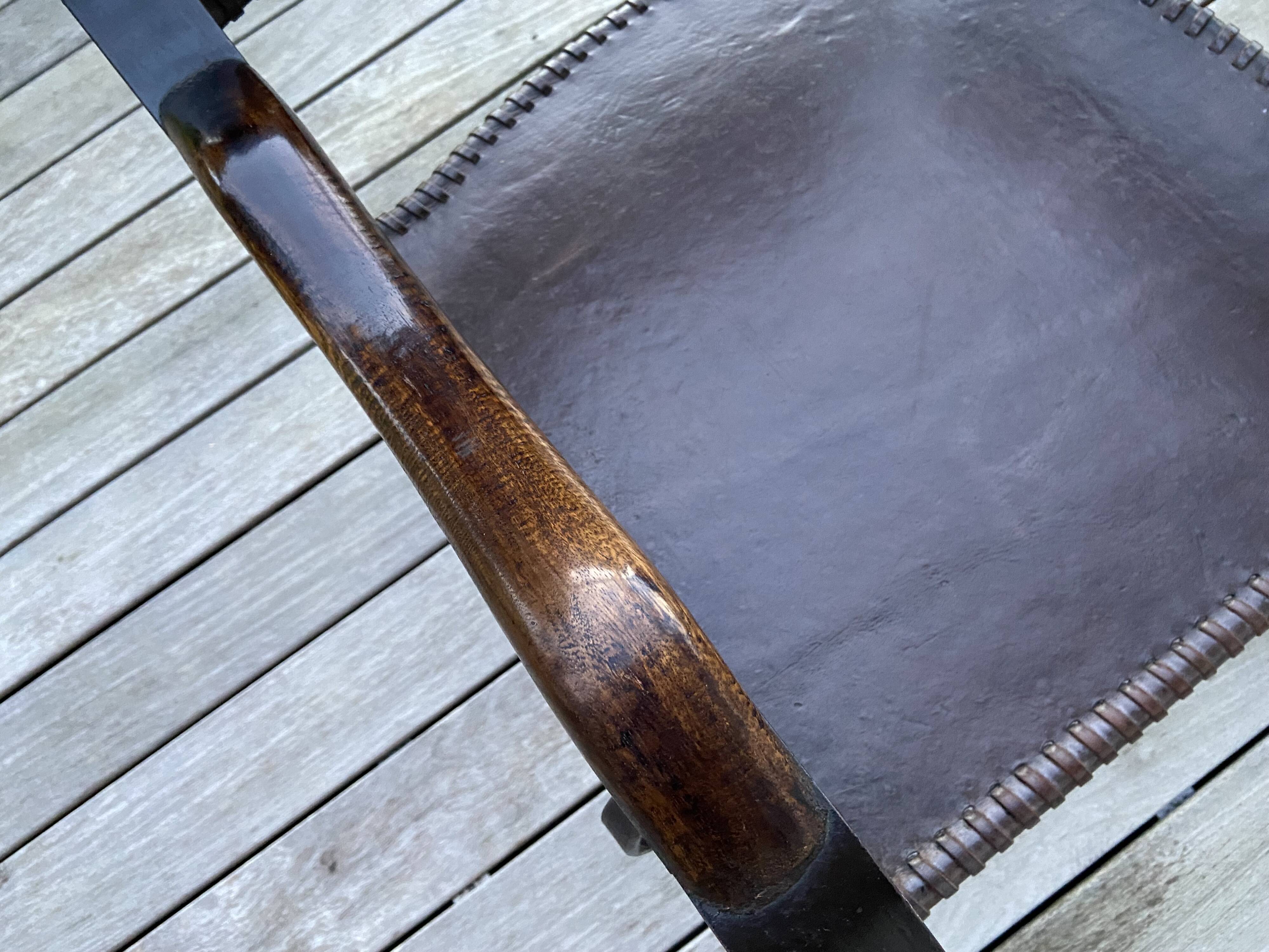 Pair of wrought iron armchairs