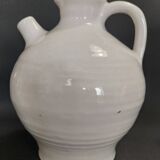 White ceramic goat-shaped creamer, first half of the 20th century.