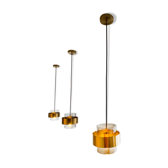 Brass and glass suspensions