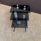 Set of 3 nesting tables in metal and smoked glass.