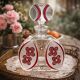 Vintage liqueur service in decorated red glass – decanter and 7 glasses