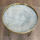 Brass coffee table with a vintage mirror top from the Baguès house.