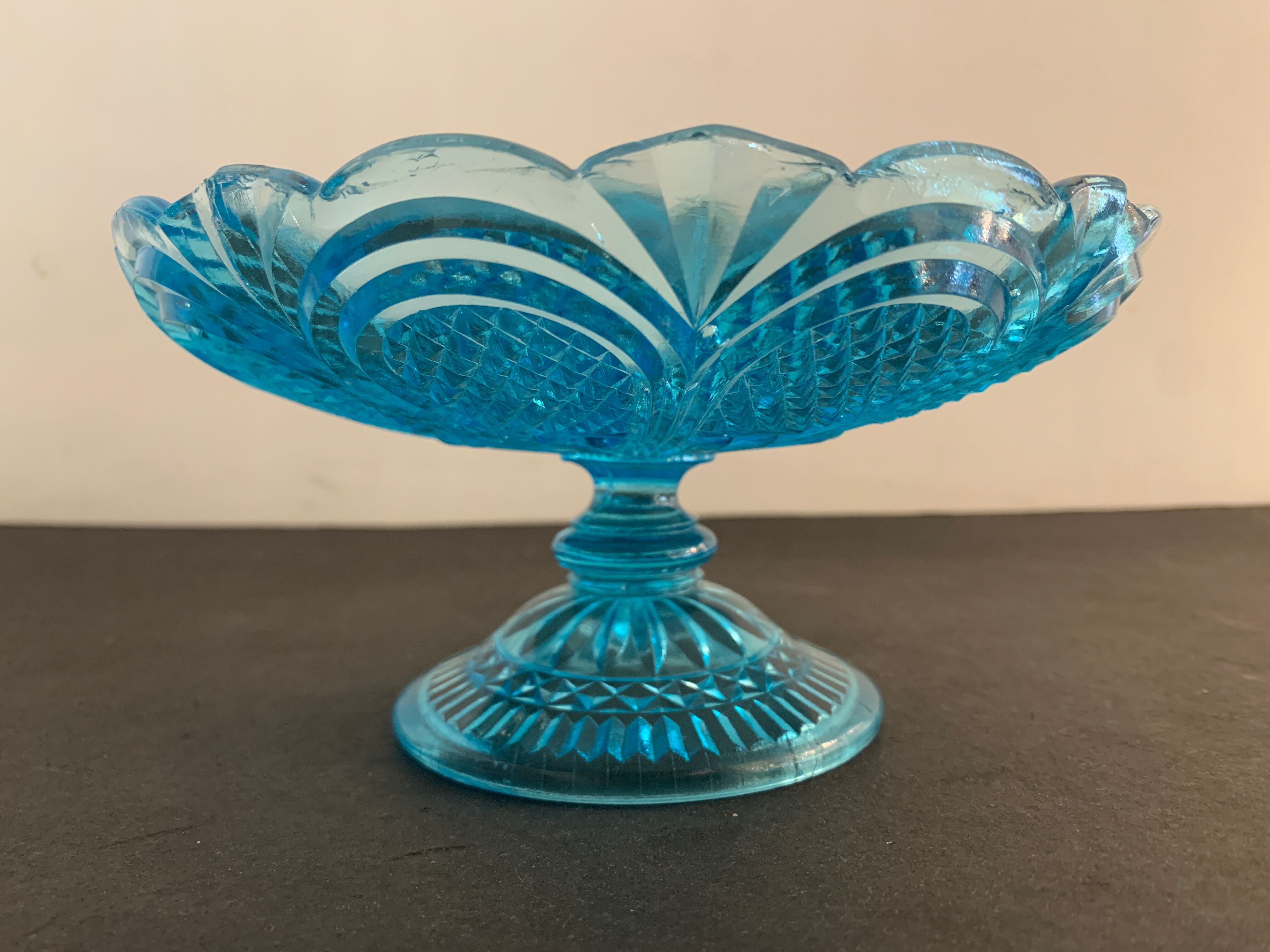 Fruit cup on blue-bubbled glass peder