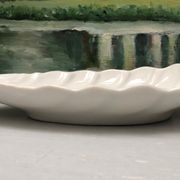 Empty pocket in fine antique porcelain, shell-shaped